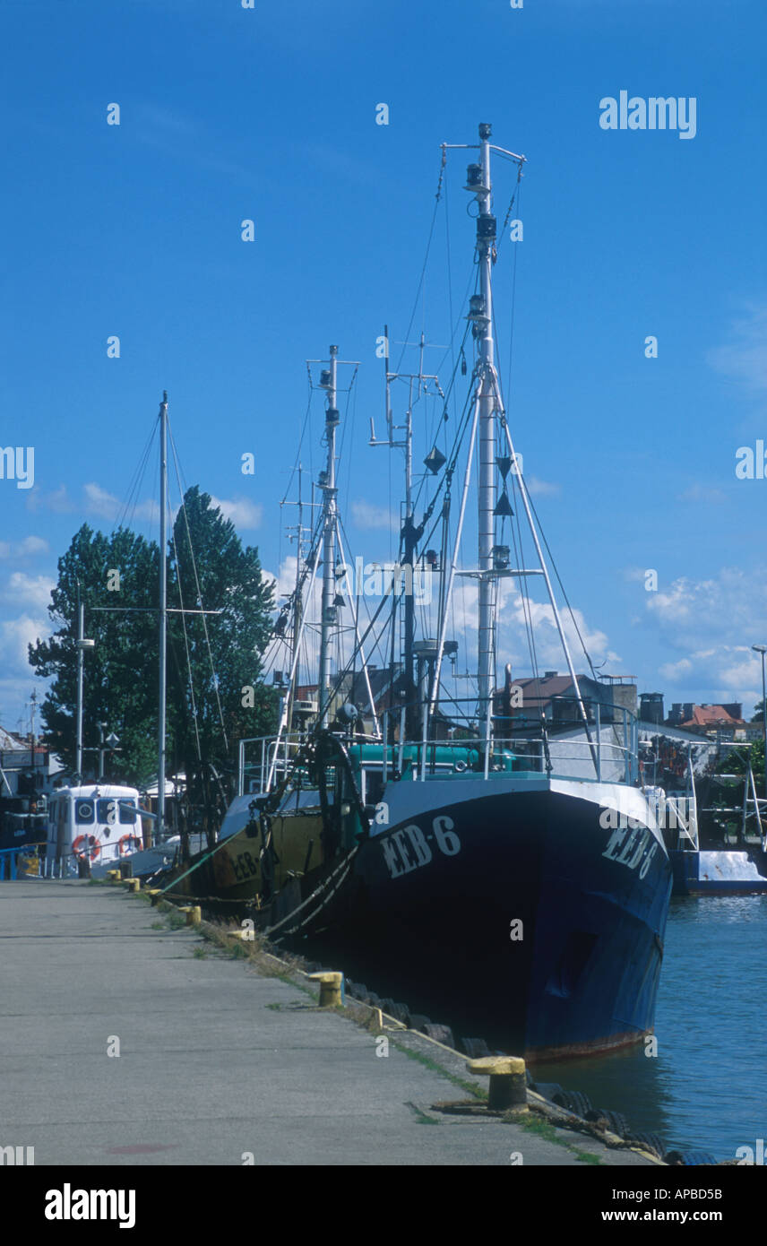 blue fishing boats quay port of Leba Baltic Sea coast Pommern Poland  Stock Photo