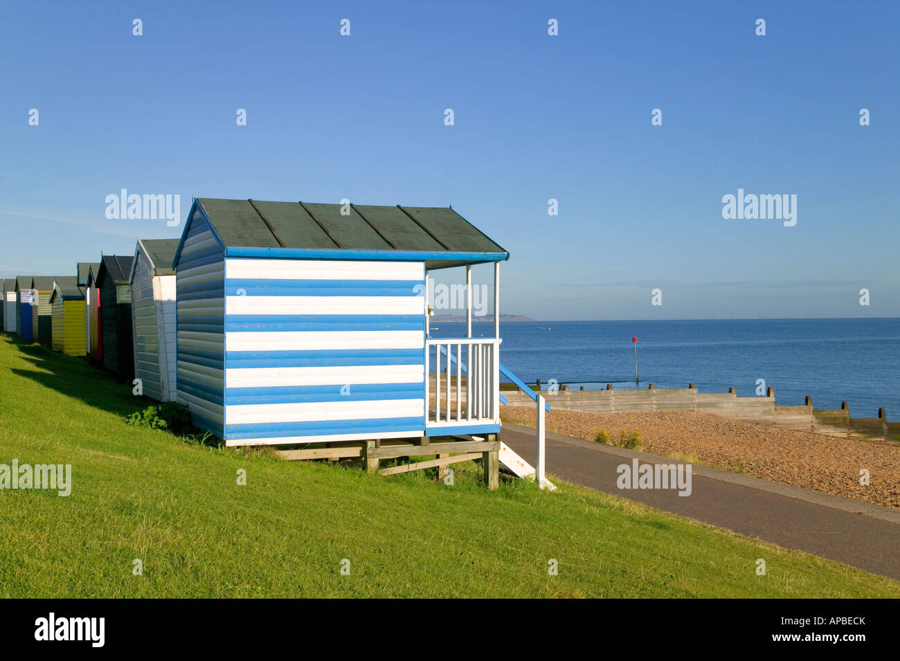Beach huts at Tankerton beach near Whitstable Kent England Stock Photo