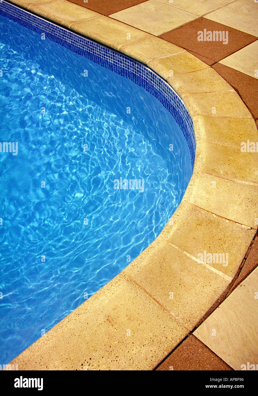 Corner Of An Outdoor Swimming Pool Showing Blue Water And