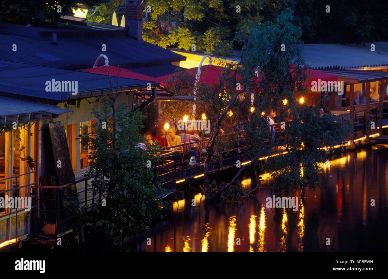 Berlin. Kreuzberg. Café Restaurant Freischwimmer on converted houseboats at an anabranch of the river Spree. Stock Photo