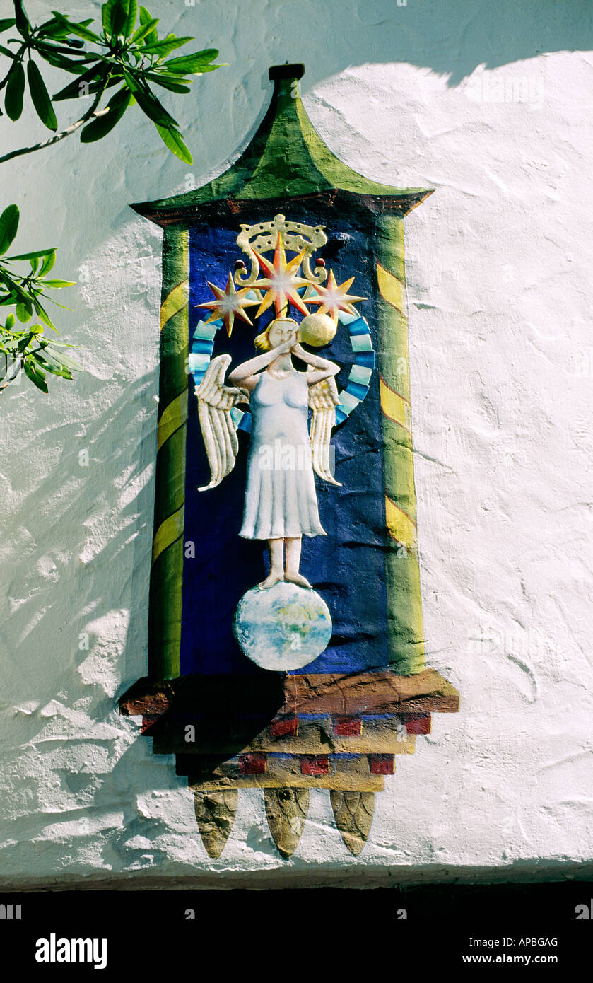 Portmeirion Italianate resort village in Gwynedd, north Wales, UK. Motif architectural detail plaque on exterior wall of house Stock Photo