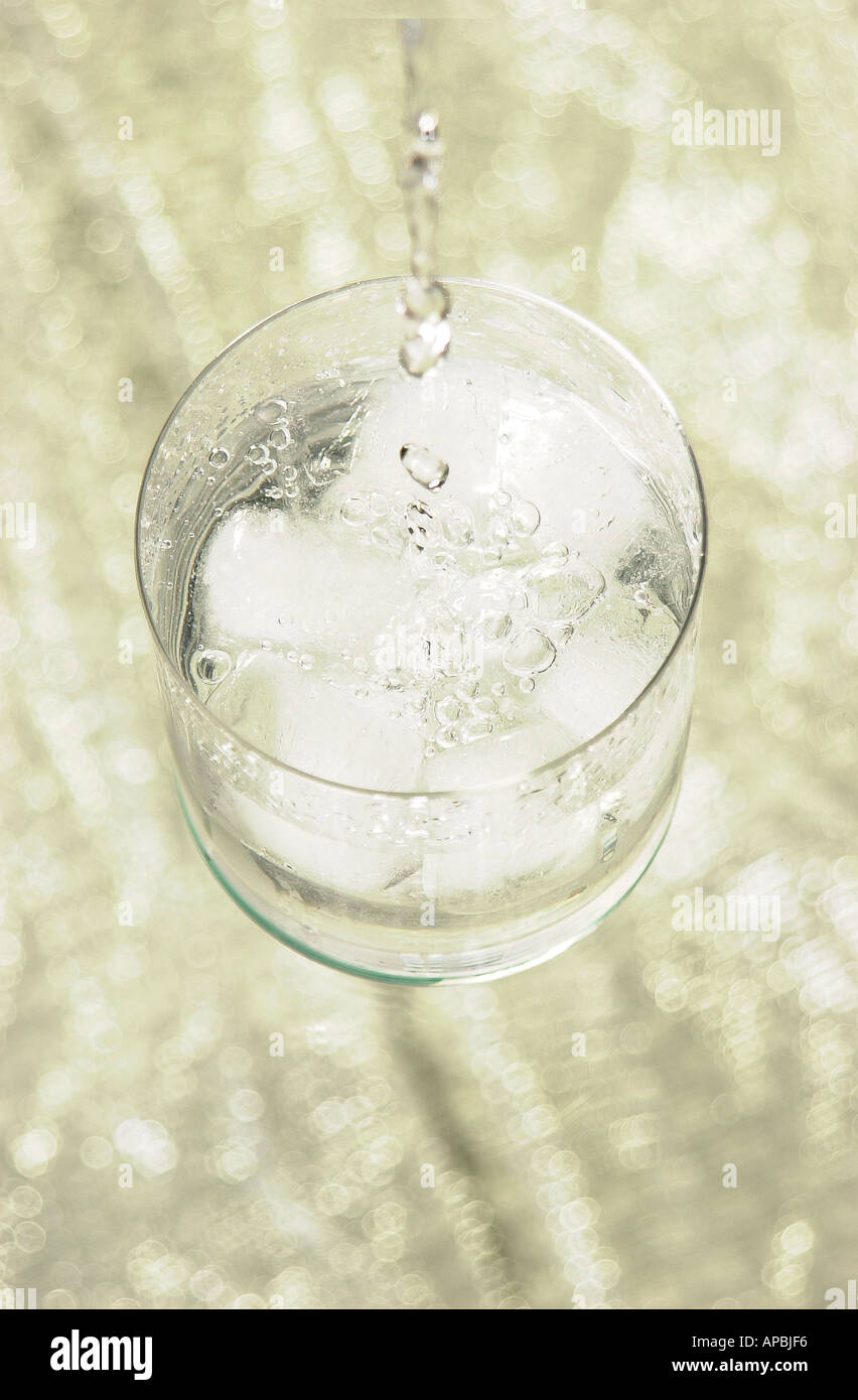 Glass of Ice and Alcohol Stock Photo