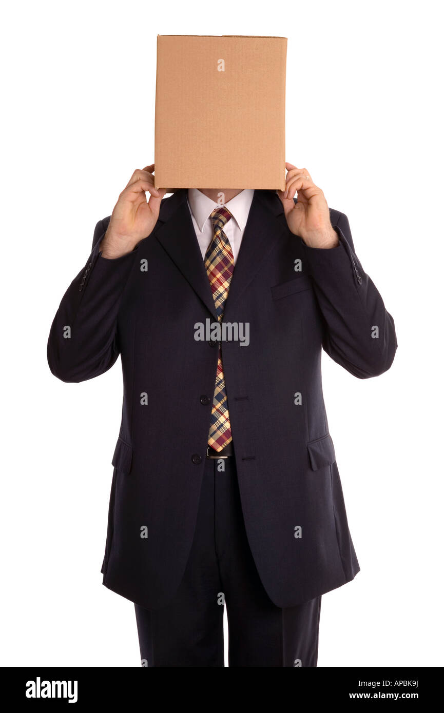 Businessman about to reveal himself from his hidden identity Stock Photo