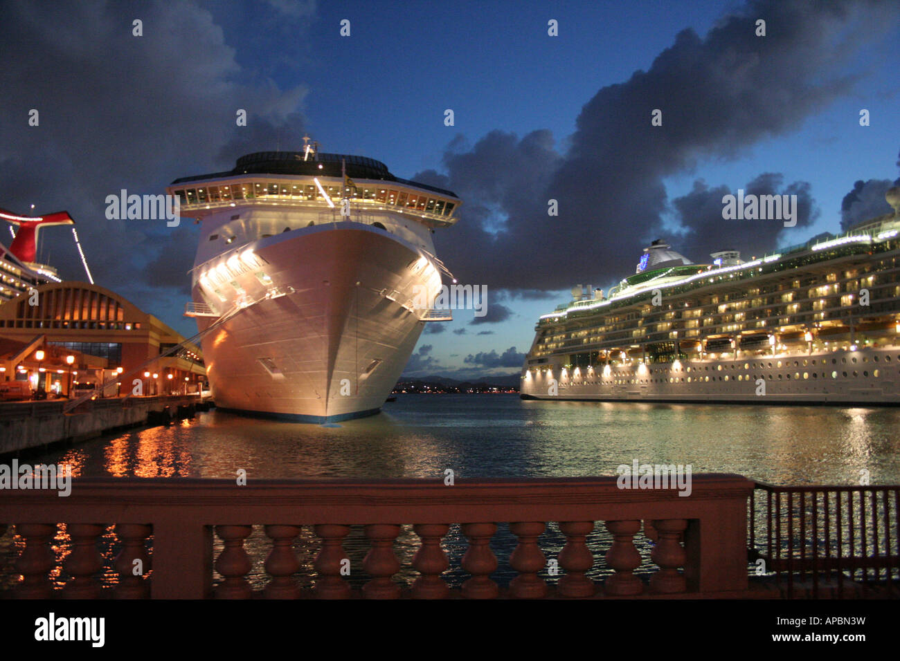 Cruise ship docked in port at night Stock Photo - Alamy