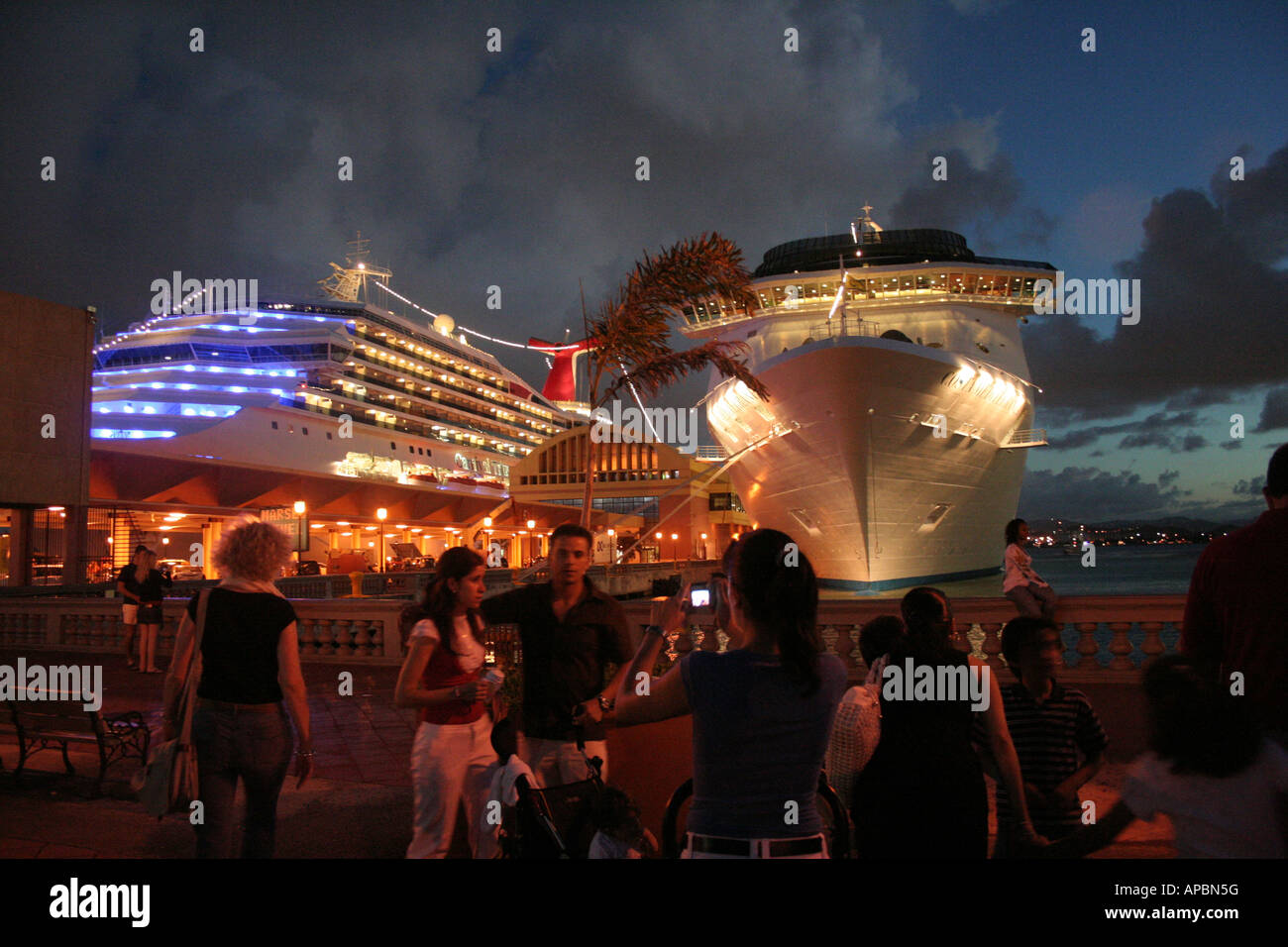 Cruise ship docked in port at night Stock Photo - Alamy