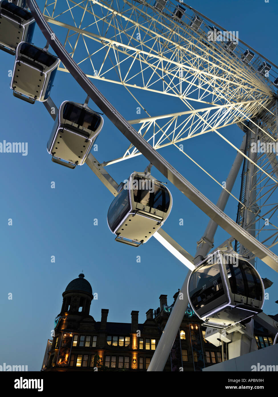 United Kingdom Manchester Exchange Square The Manchester Wheel a ferris wheel used as a tourist attraction Stock Photo