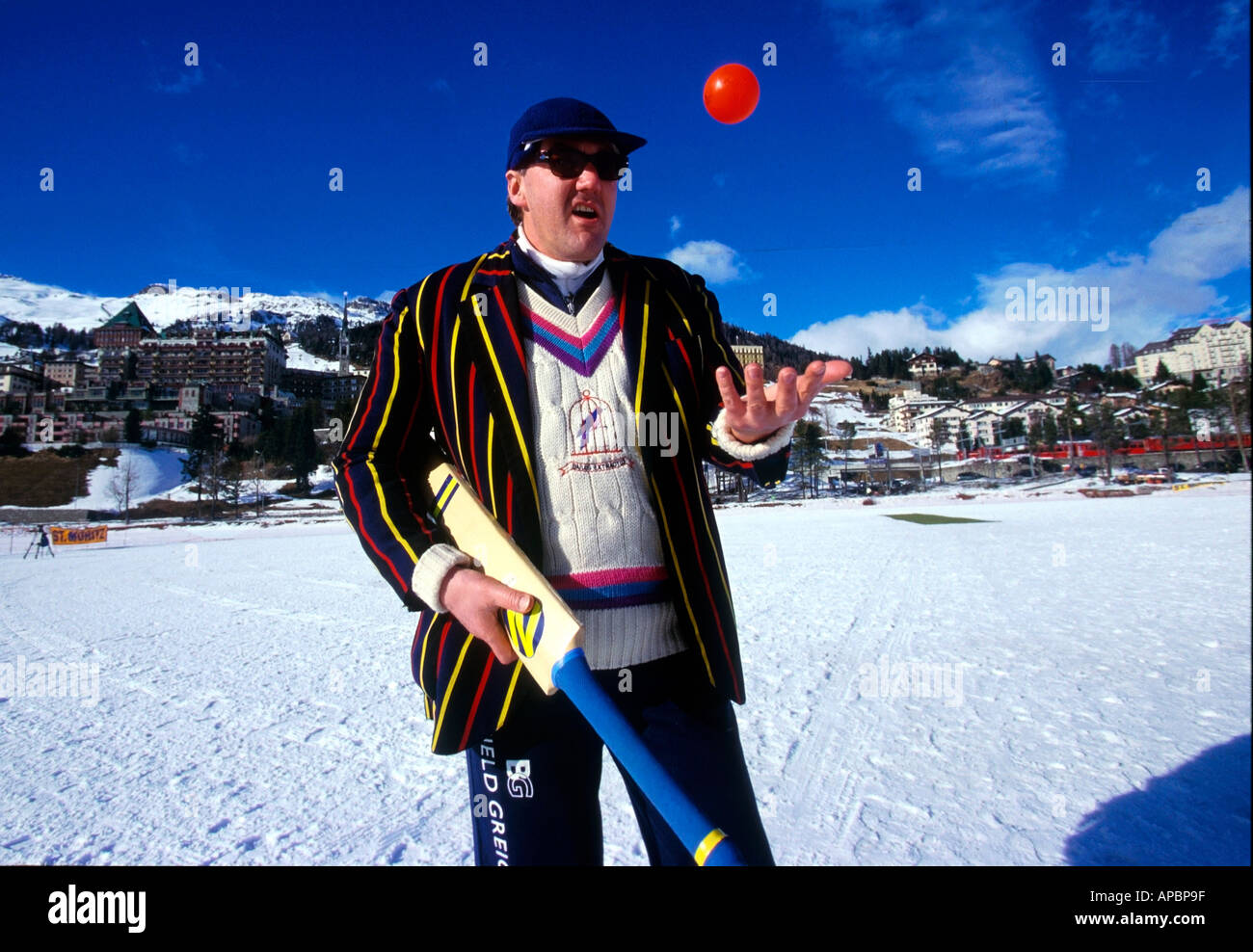Cricket player on frozen lake, St. Moritz, Switzerland Stock Photo