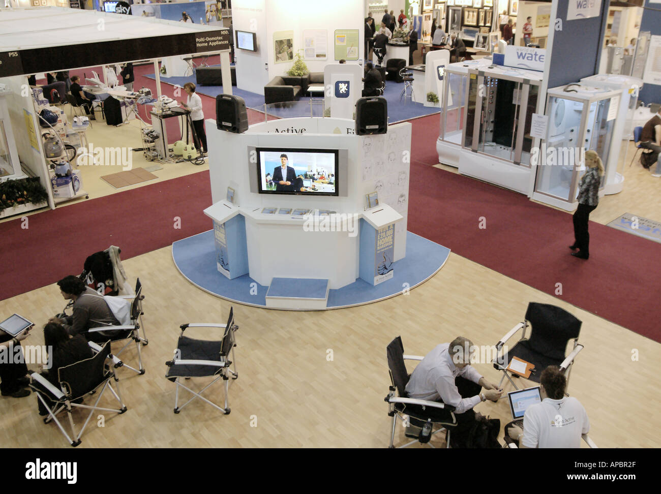 trade stands and people at the Ideal Homes Exhibition Earls Court Stock Photo