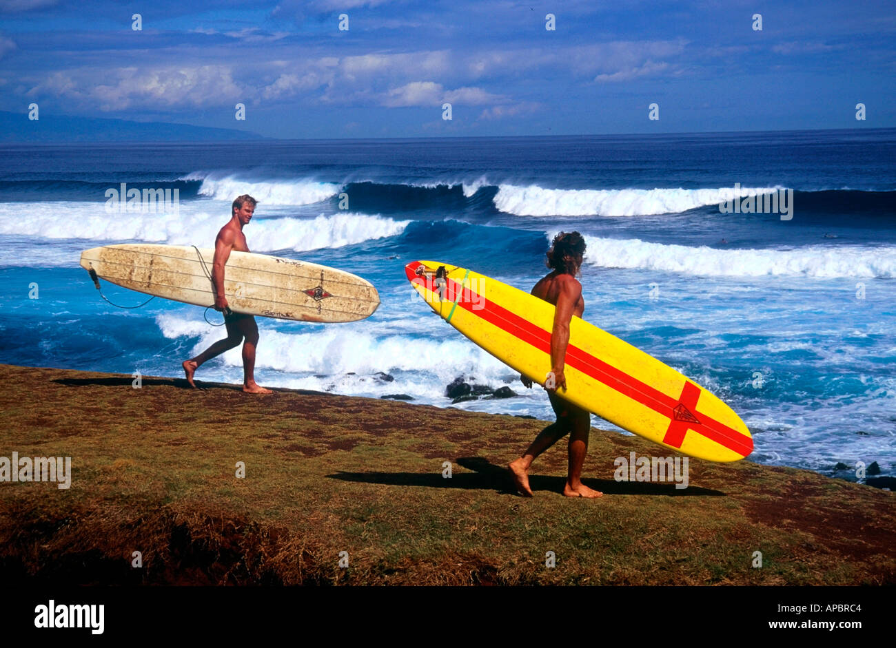 Top surfer Laird Hamilton left at Hookipa Maui in Hawaii Stock Photo