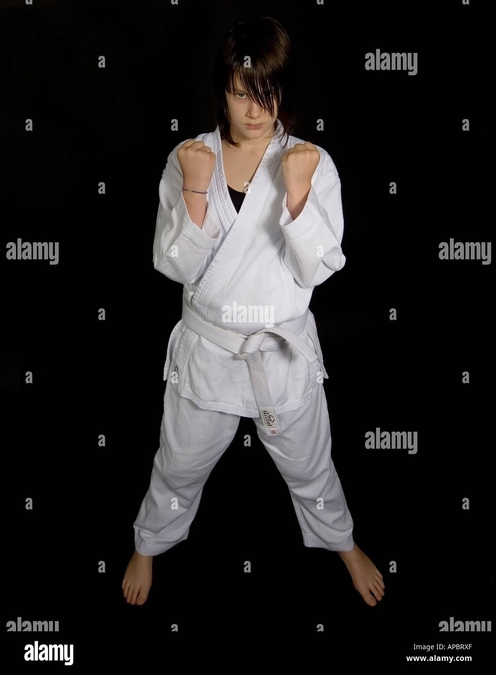 Young girl aged 13 in typical martial arts pose Stock Photo Alamy
