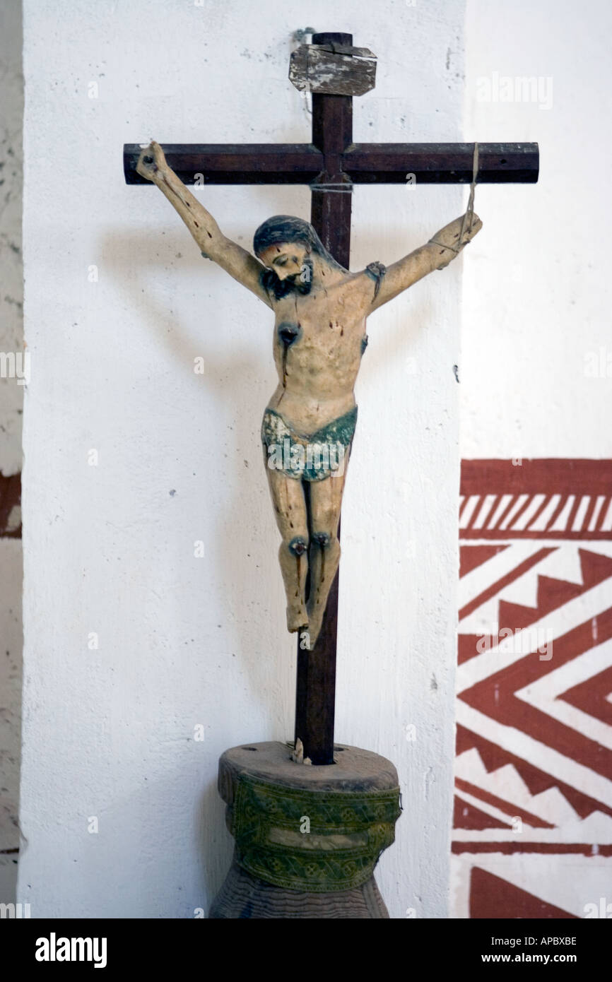 Wooden sculpture of Christ in the restored Mission De Los Cinco Santos Senores a church built in 1752 by the Jesuits in Cusarar Stock Photo