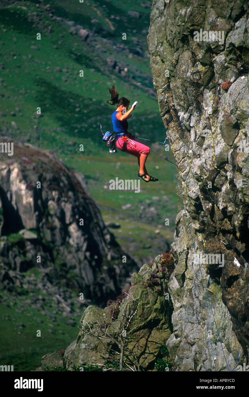 Glenda Huxter airborne on Scimitar Ridge Llanberis Pass North Wales Stock Photo