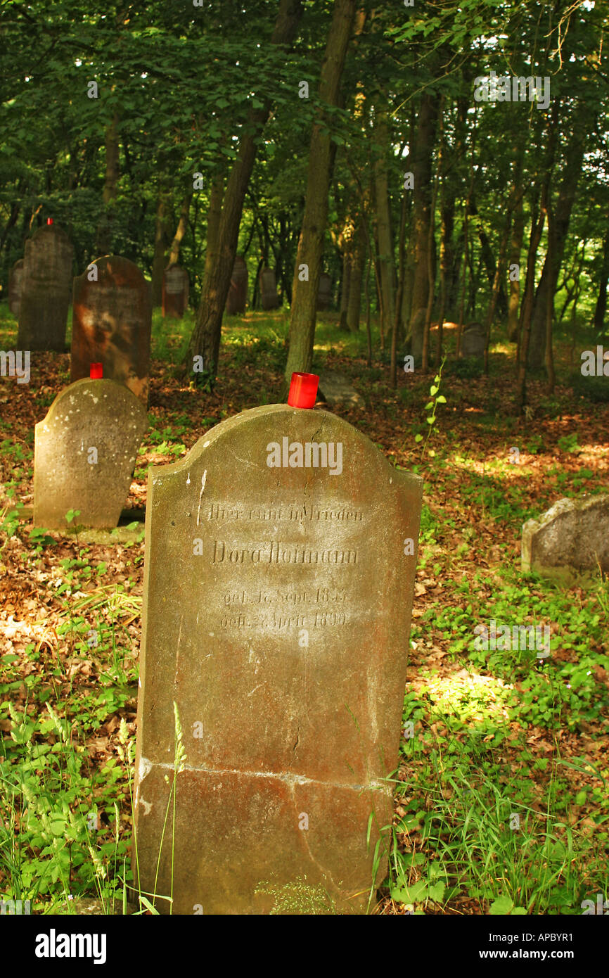 Red candles on tombstones at the jewish cemetry of Runkel, Lahn, Hesse