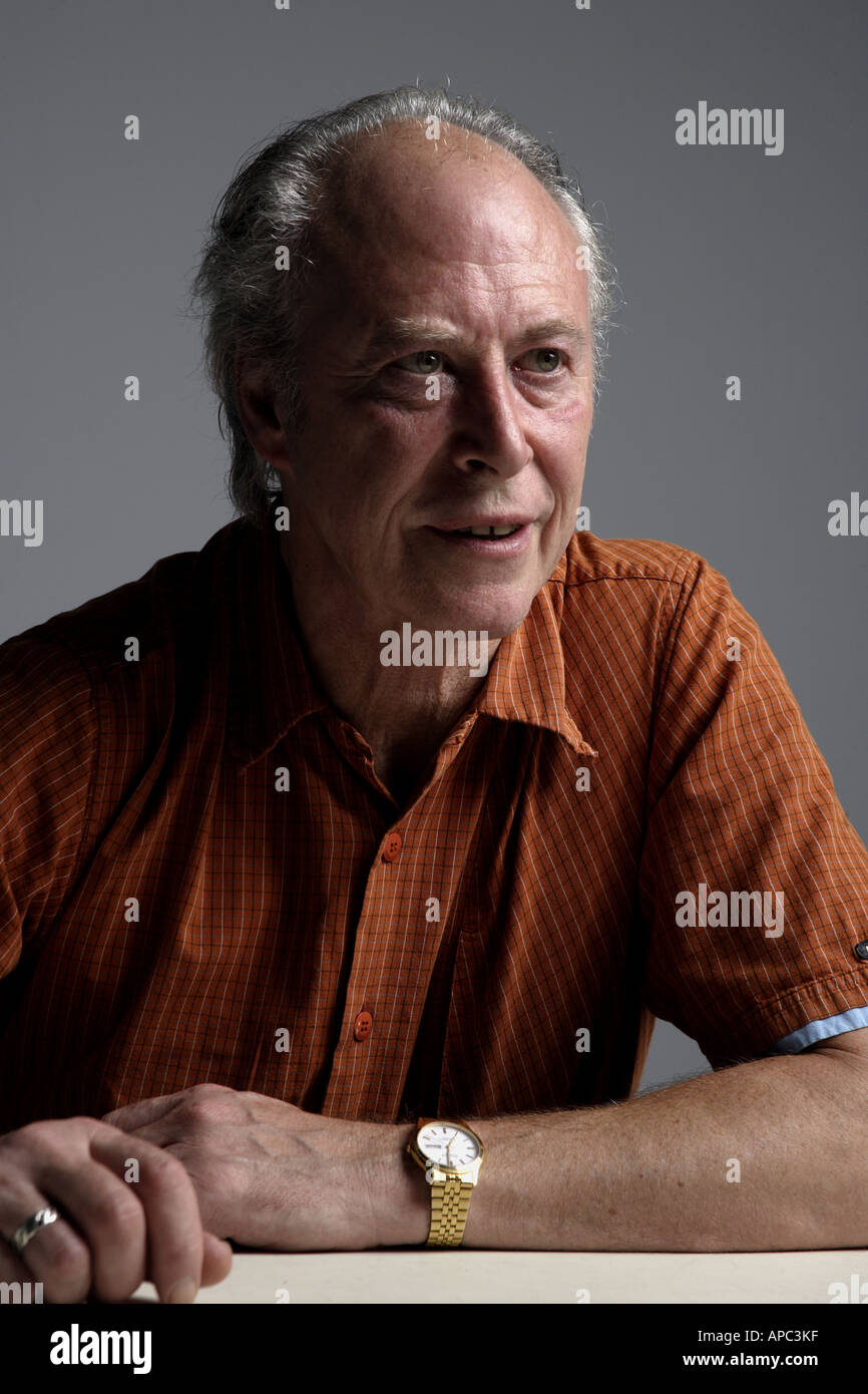 Waiting mature man sitting at table Stock Photo