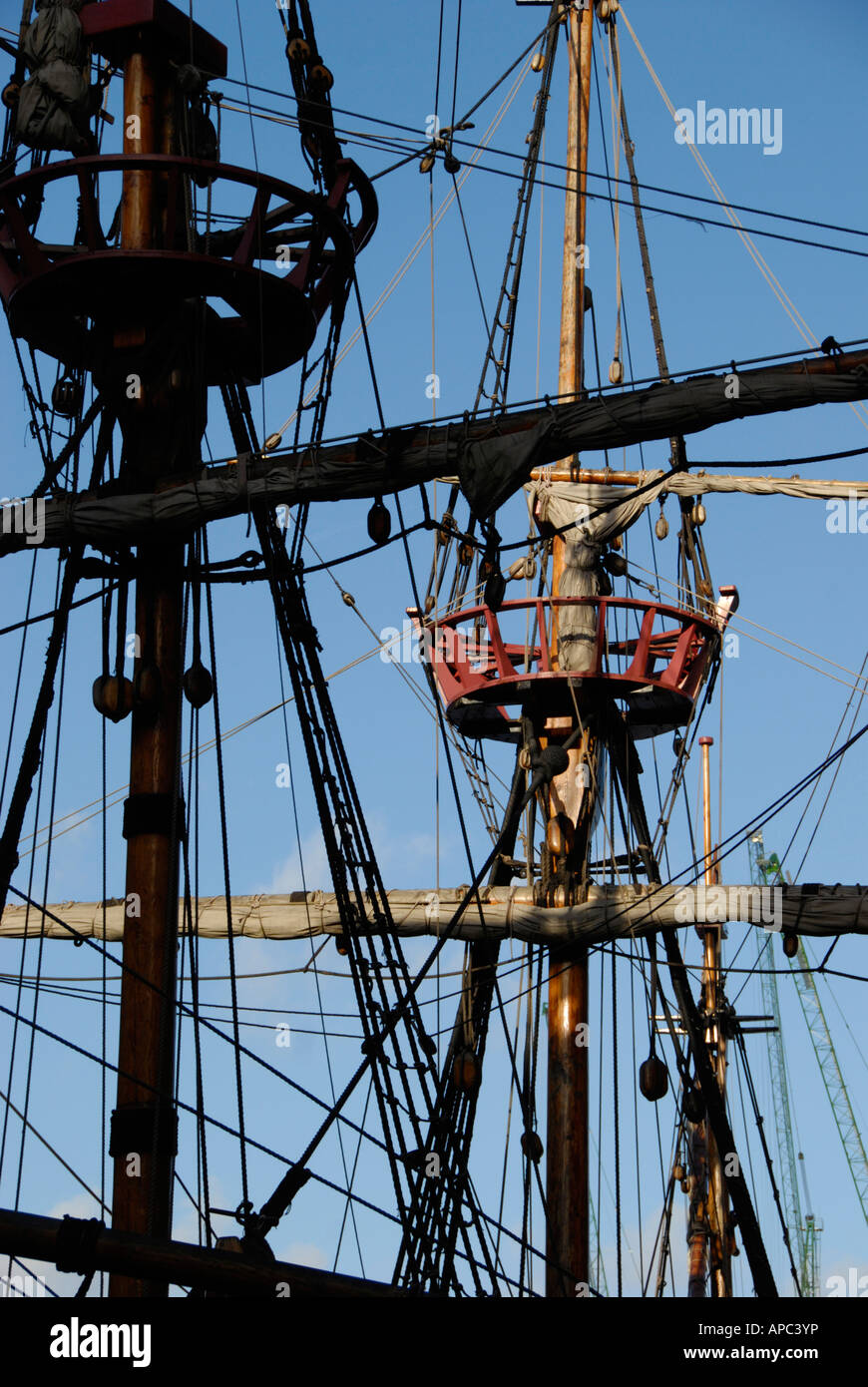 Masts and rigging of the Golden Hinde replica at Southwark on the River Thames, London, England Stock Photo