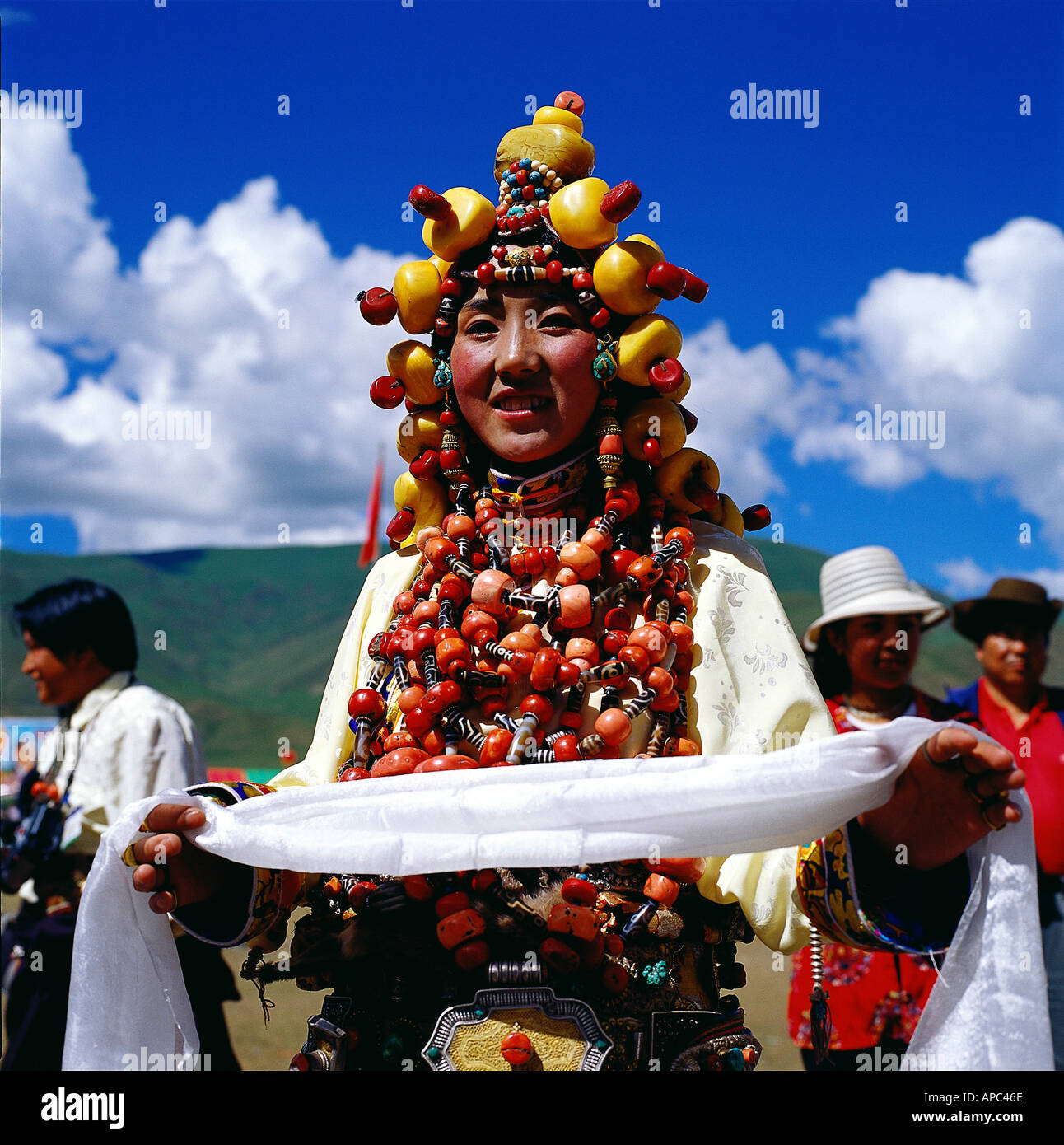 a portrait of a tibetan woman holding a hada Stock Photo