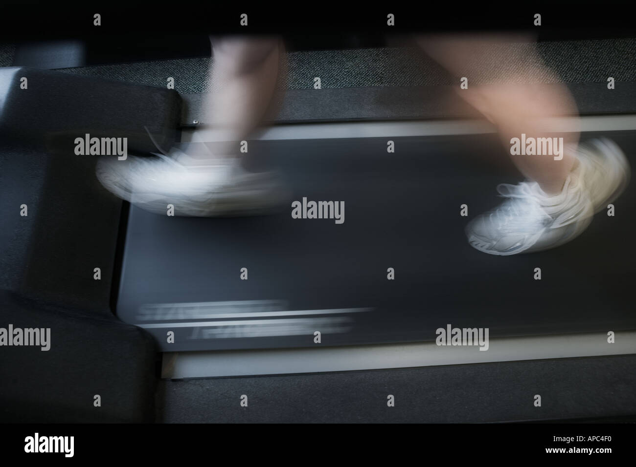 running-feet-on-treadmill-1-stock-photo-alamy