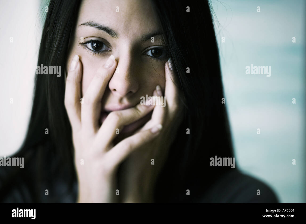 Girl Holding Face 1 Stock Photo Alamy