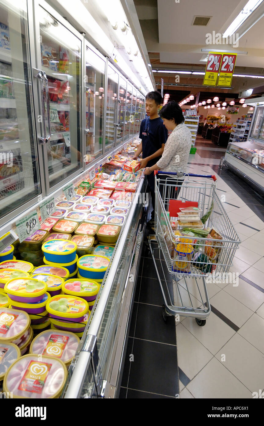 Buying groceries and food in a Singapore supermarket Stock Photo Alamy