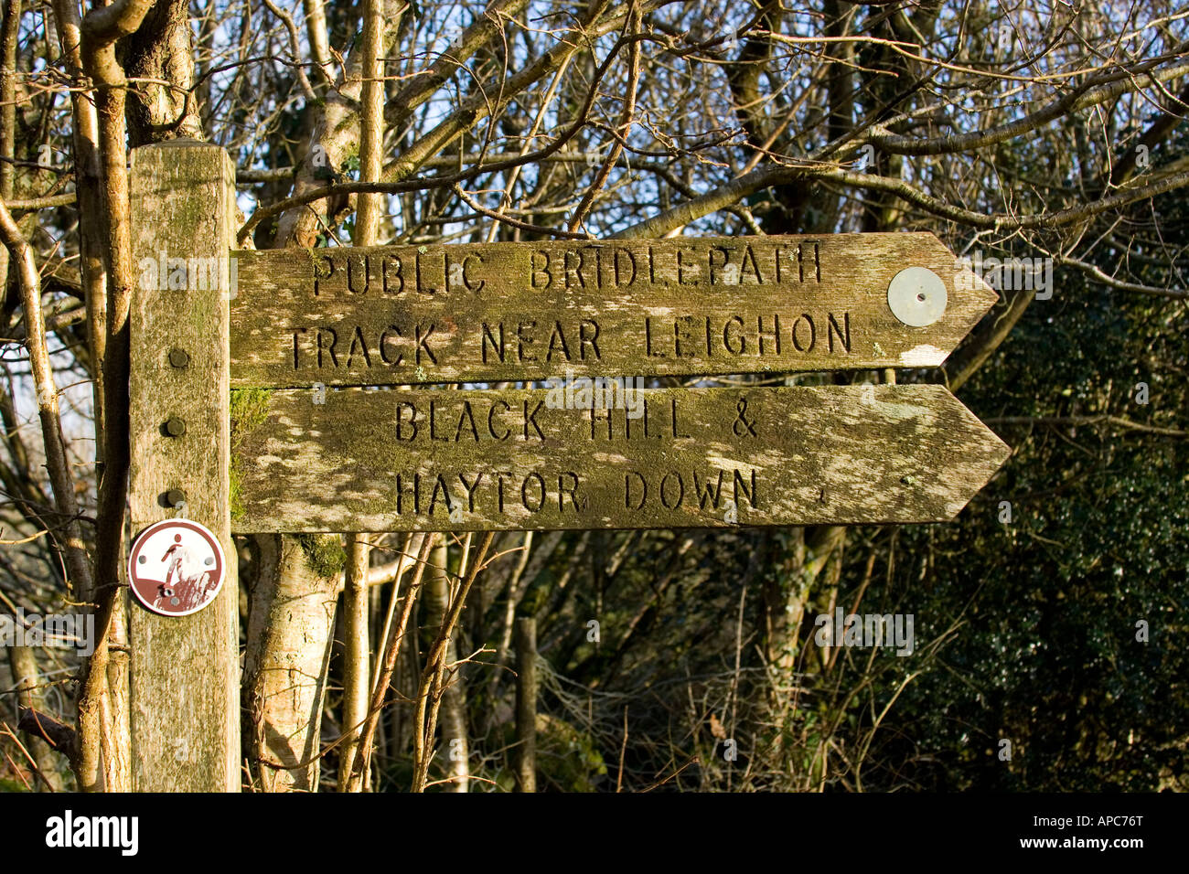 Wooden signpost pointing to Black Hill & Haytor, Dartmoor, Devon ...
