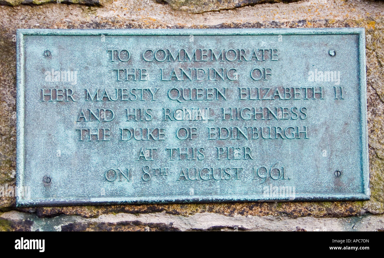 Plaque commemorating the landing place on 8 August 1961, of Queen Elizabeth II and HRH Duke of Edinburgh, Carrickfergus, Antrim Stock Photo