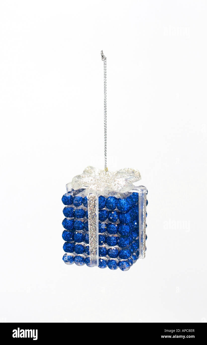 A blue and silver hanging Christmas tree decoration in the shape of a