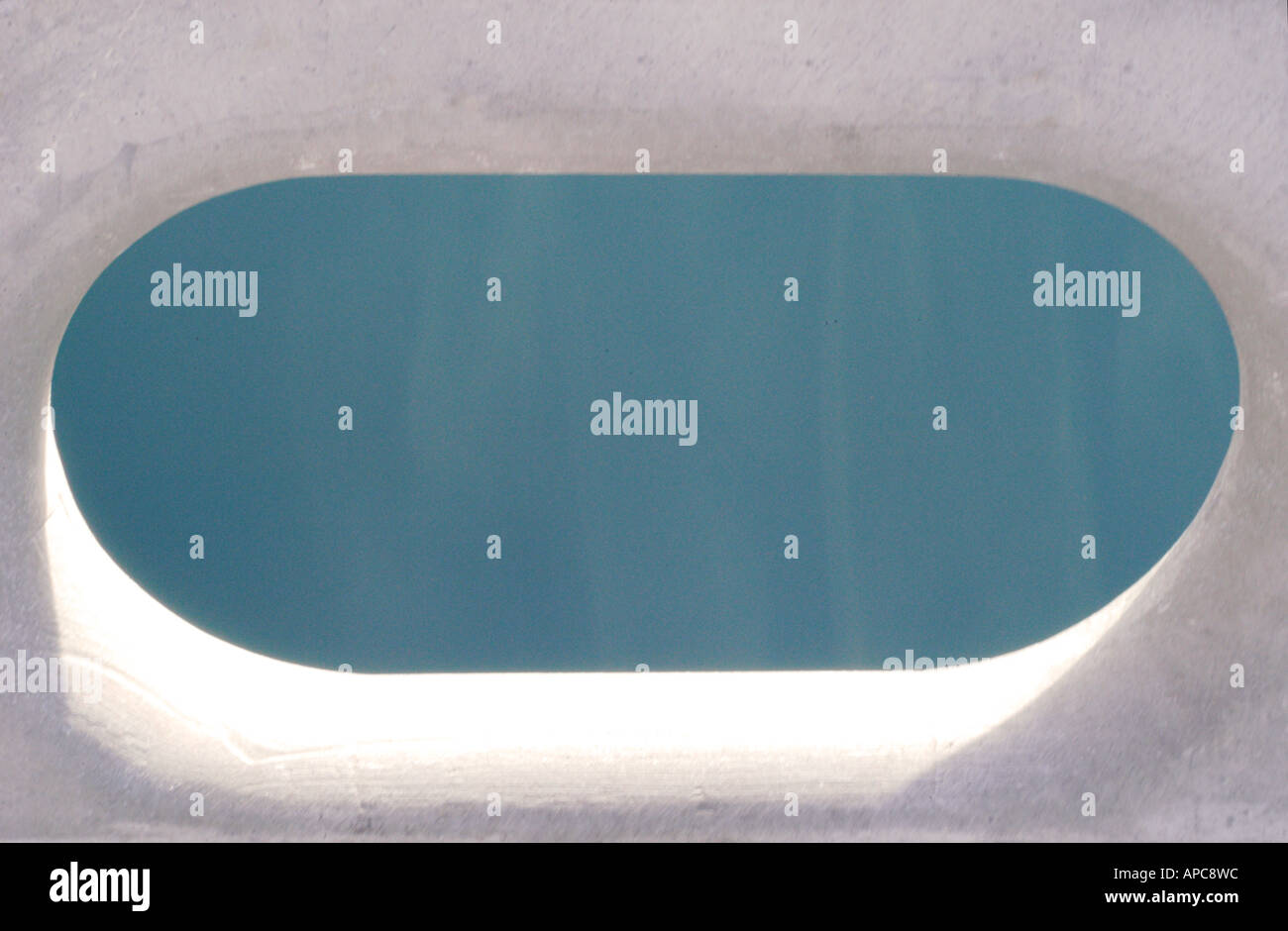 looking through port hole at sea moving along Stock Photo
