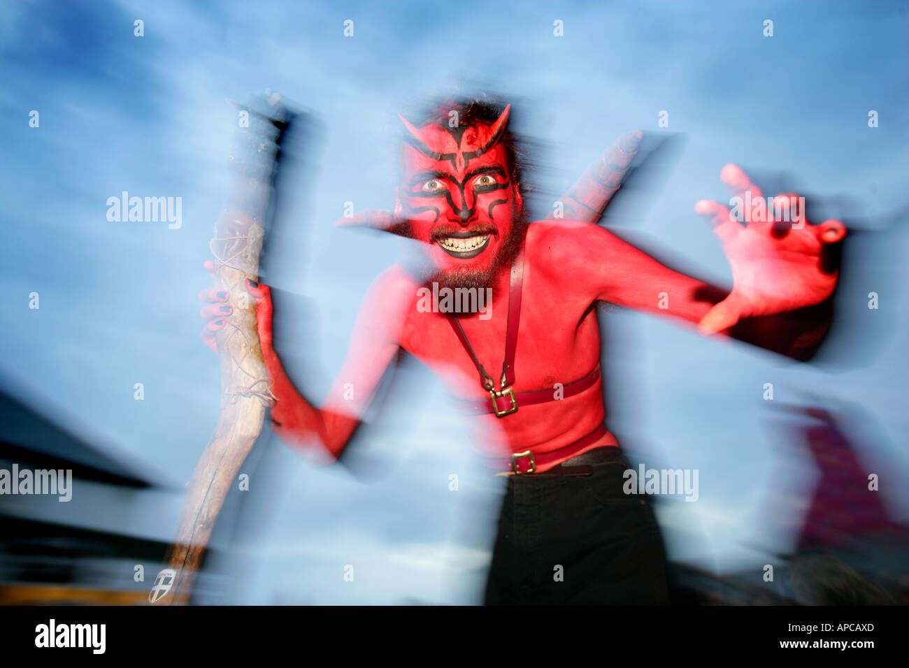 Devil performers at Lands end cornwall Stock Photo