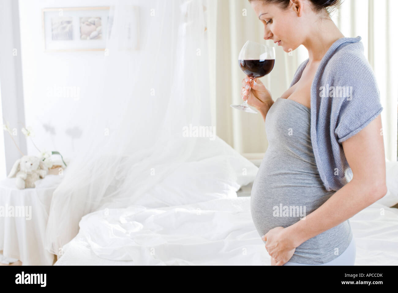 pregnant woman drinking red wine Stock Photo Alamy