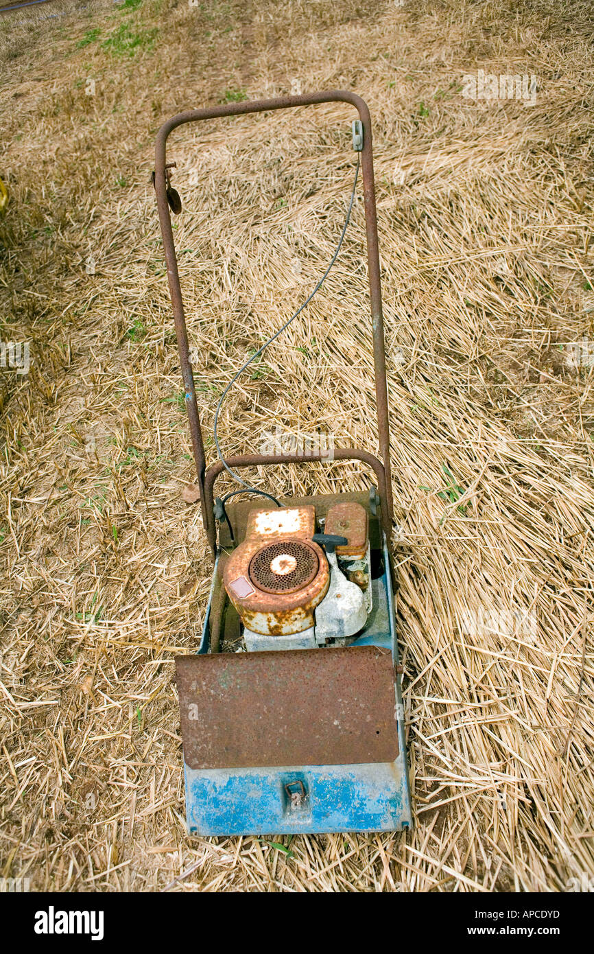 Early petrol driven rotary mower Stock Photo