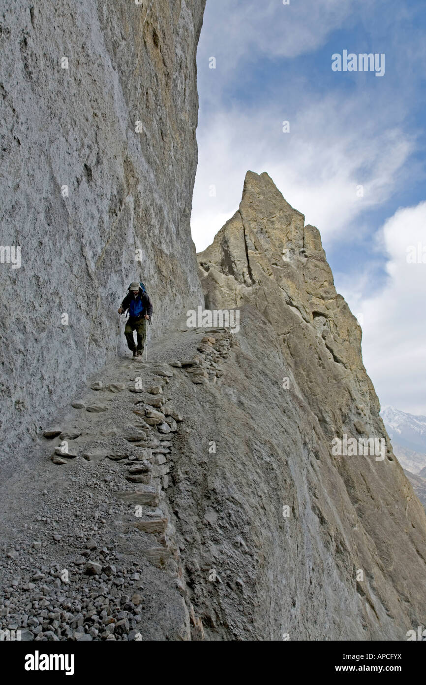 Trekker on the way to Tilicho Lake. Annapurna circuit trek. Nepal Stock Photo
