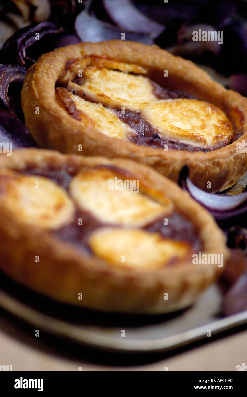 ROASTED GOATS CHEESE AND RED ONION TART Stock Photo Alamy