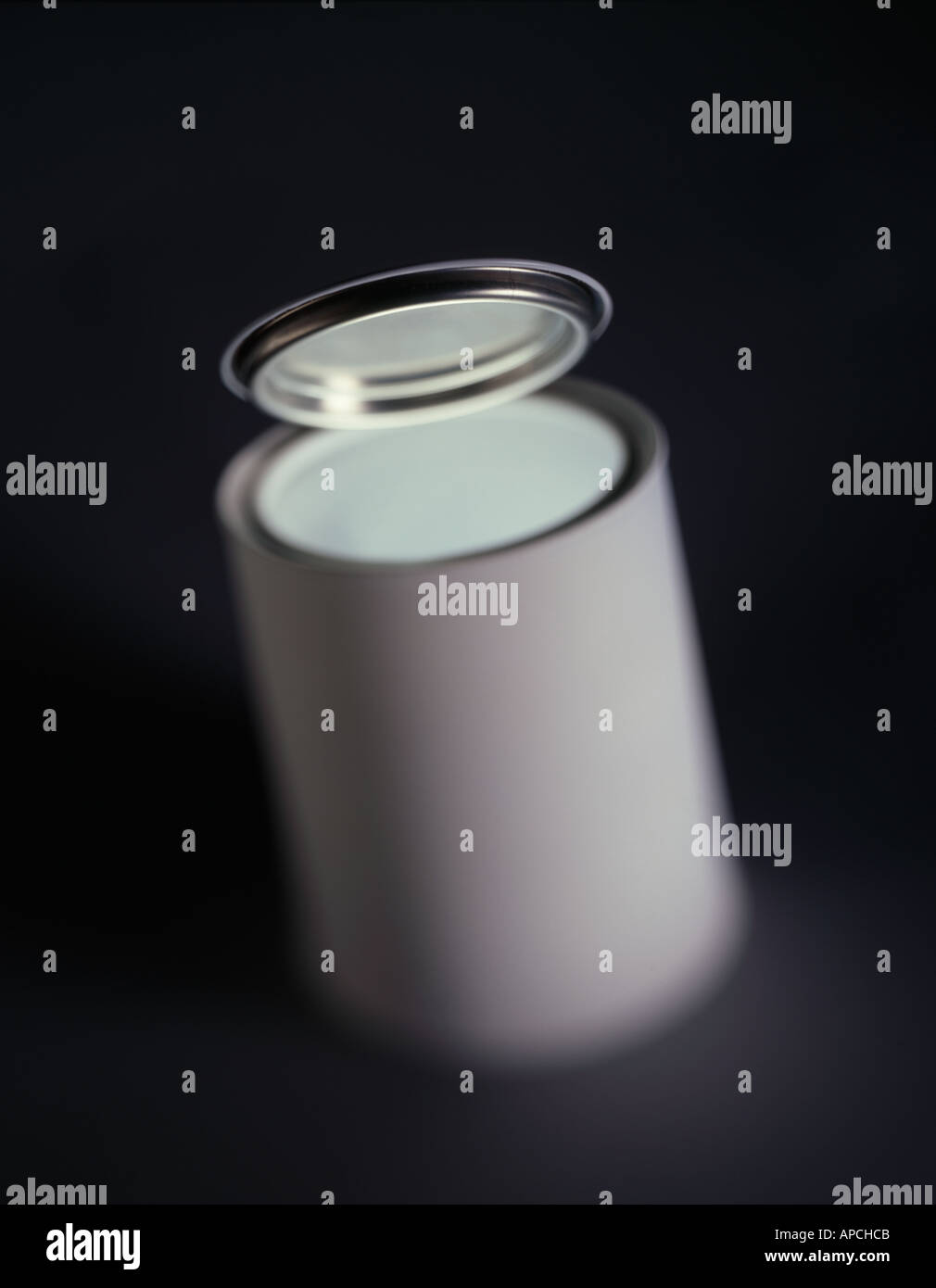 OPEN GREY PAINT TIN AGAINST A BLACK BACKGROUND Stock Photo Alamy