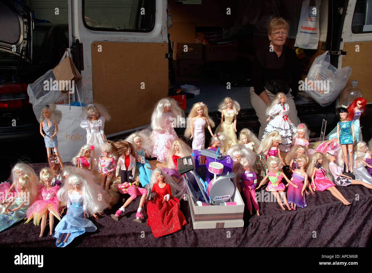 Secondhand Barbie dolls for sale at a