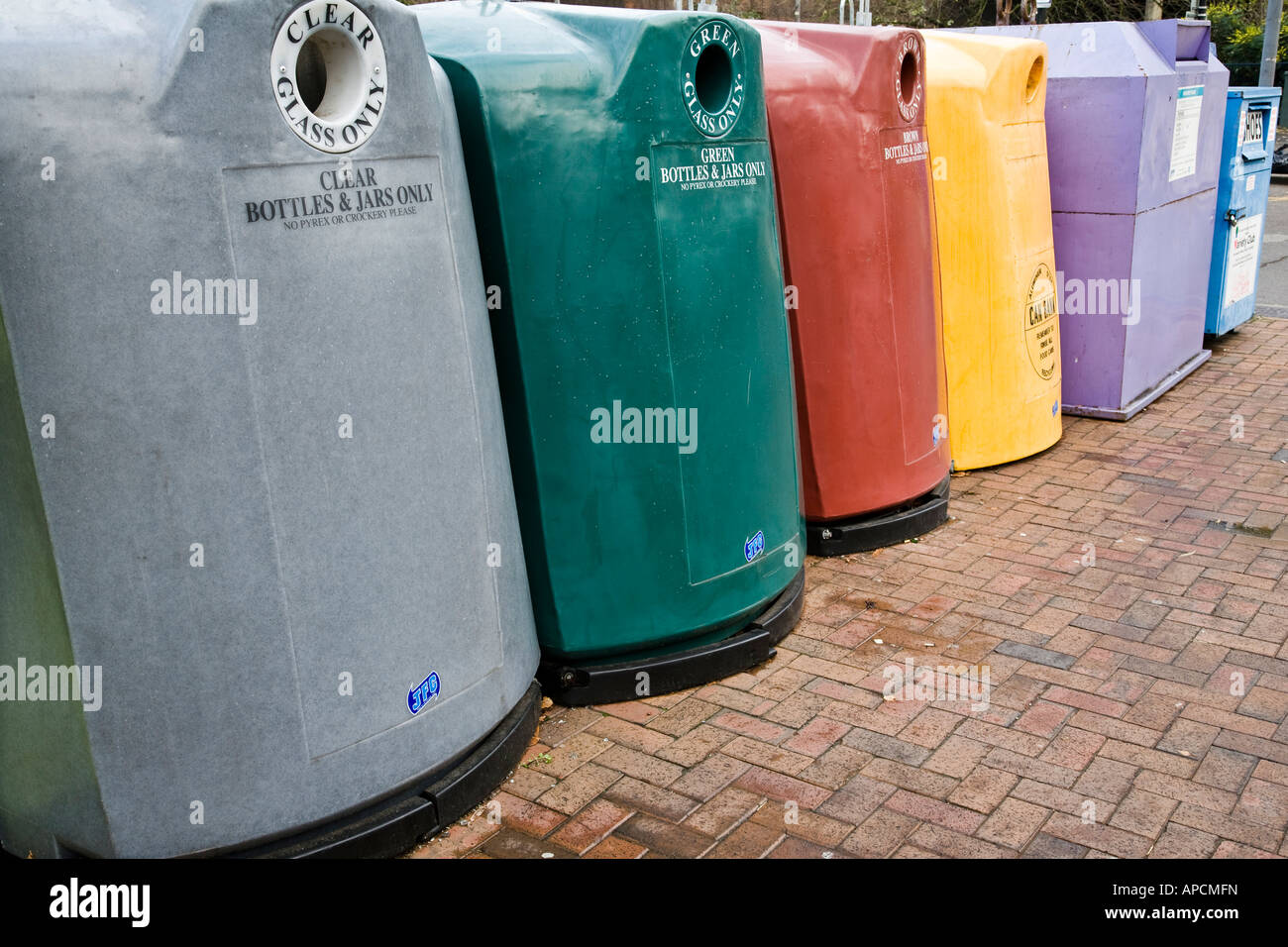 A row of recycling containers in Guildford town centre, Guildford, Surrey, England Stock Photo
