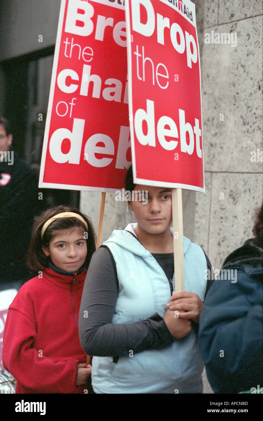 Children taking part in demonstration asking government to drop the debt to third world countries. Stock Photo