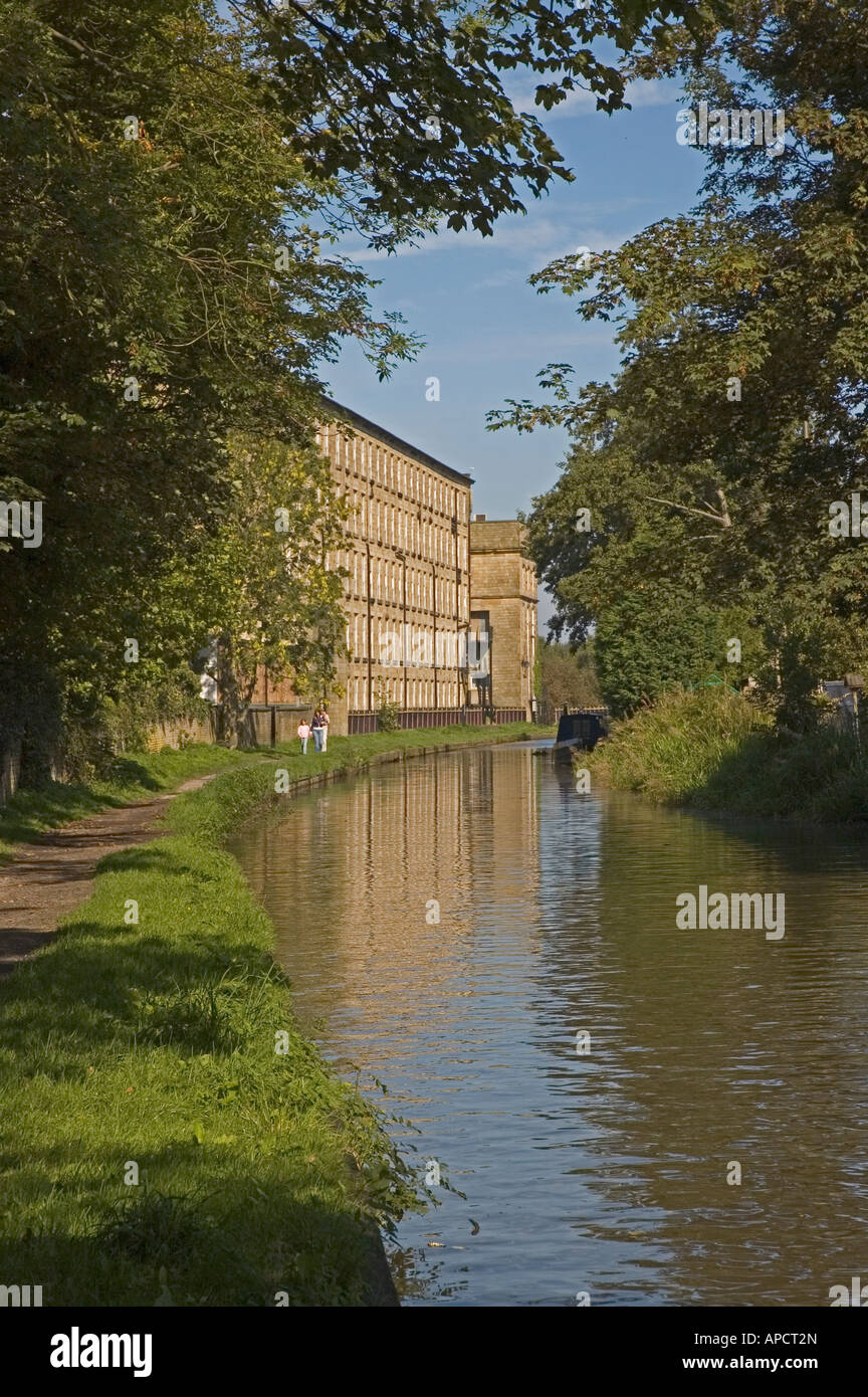 UK Cheshire Bollington Leeds Liverpool canal with mill and footpath