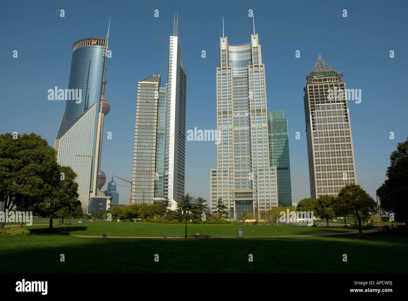 Park near apartment buildings in Financial district, Pudong special economic zone on the east side of the Huangpu River Stock Photo