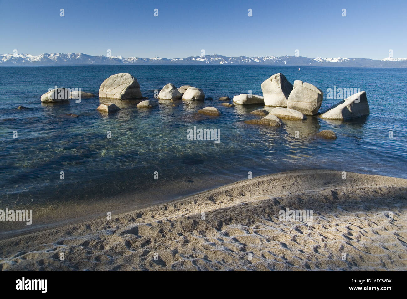 Rocks on the east shore of Lake Tahoe on a sunny day in winter. Stock Photo