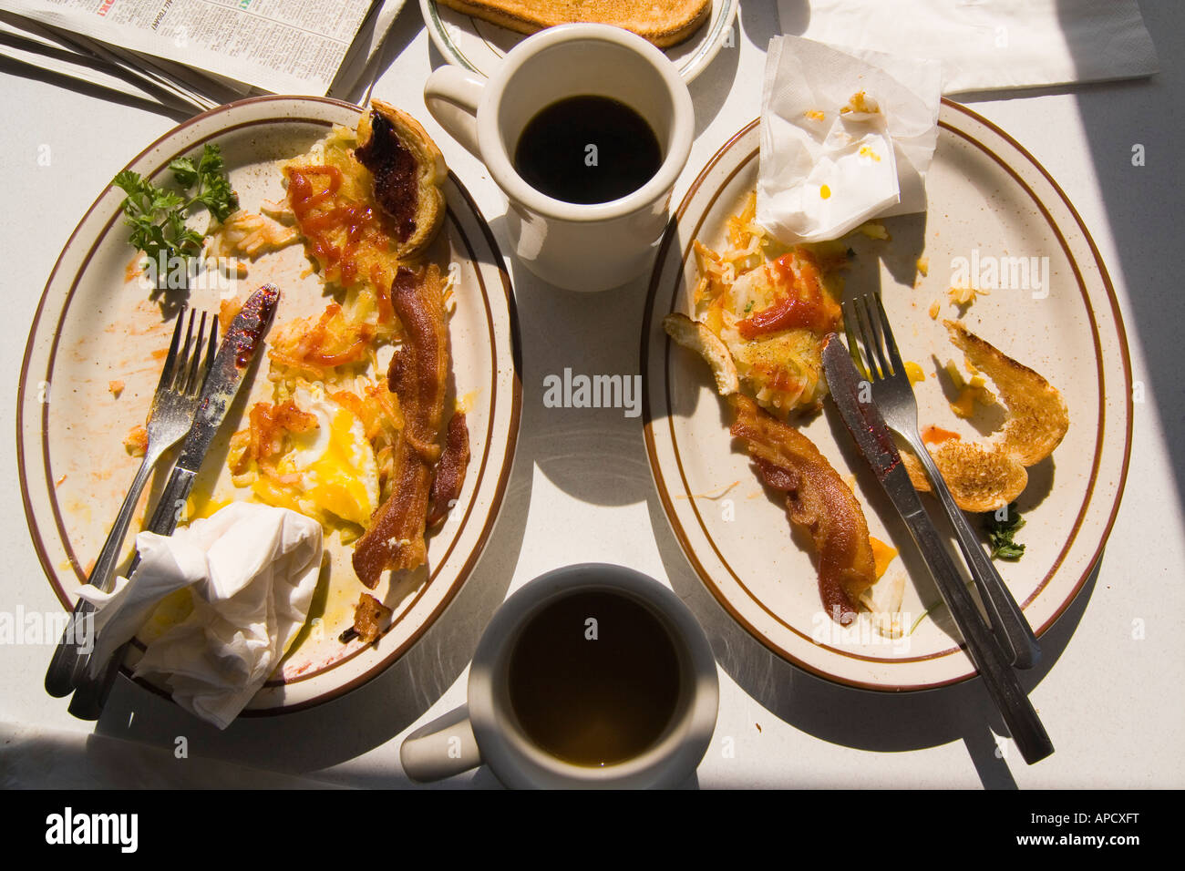 Two finished breakfasts on a table at a diner in Truckee, California Stock Photo