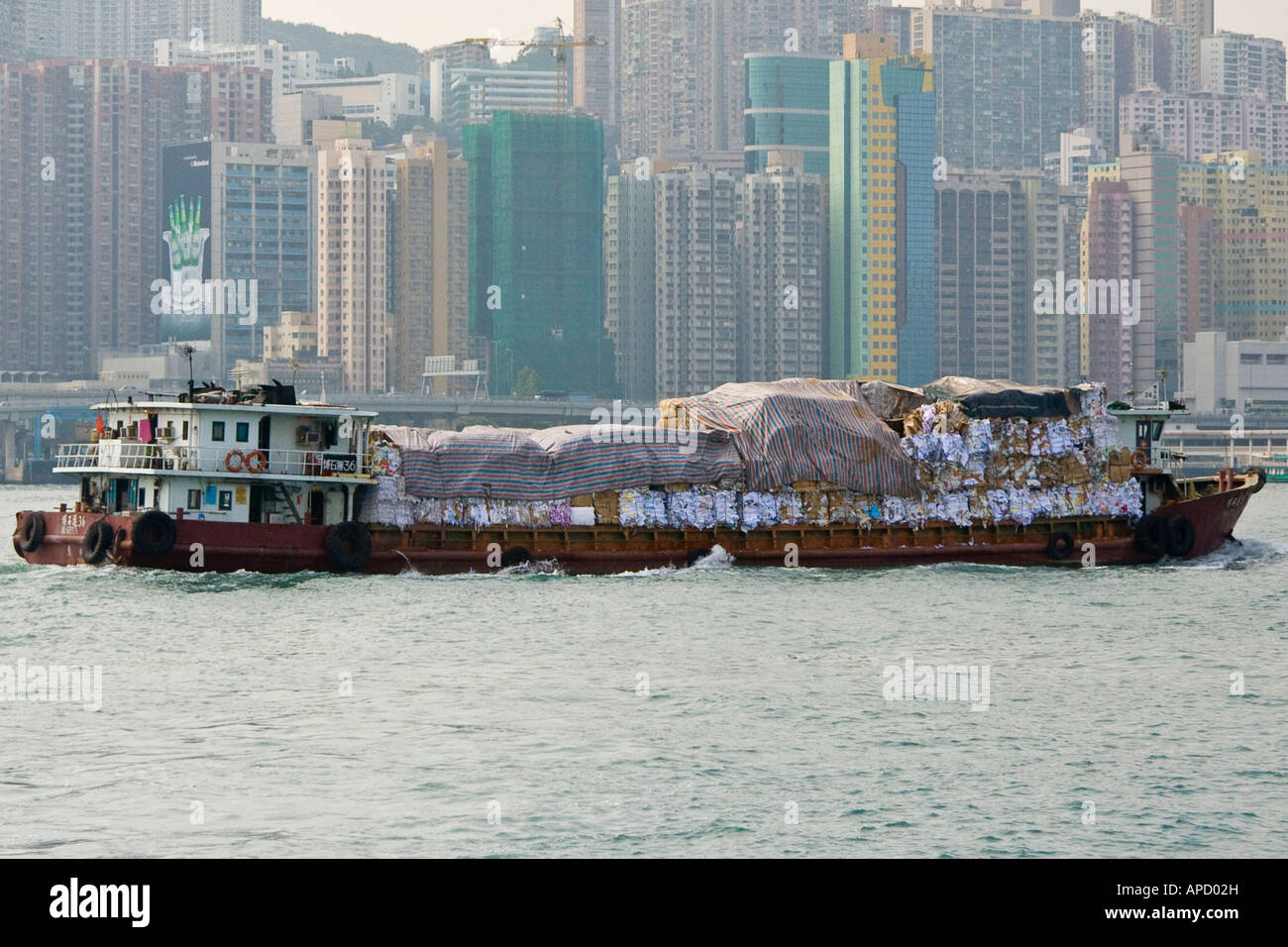Recycled Paper on a Barge in Victoria Harbour Hong Kong Stock Photo