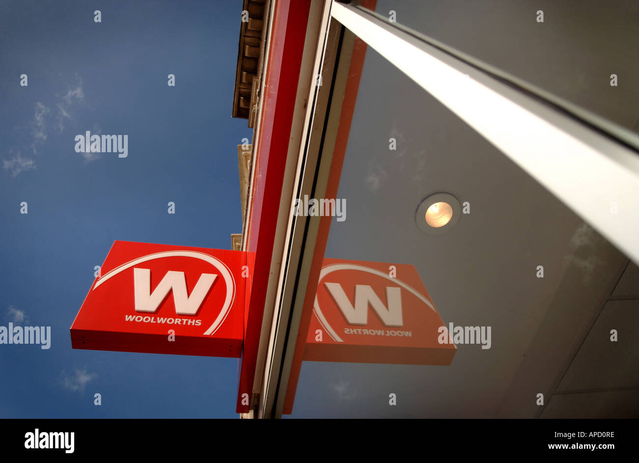 A  Woolworths store sign reflected in a window from Taunton Somerset Stock Photo