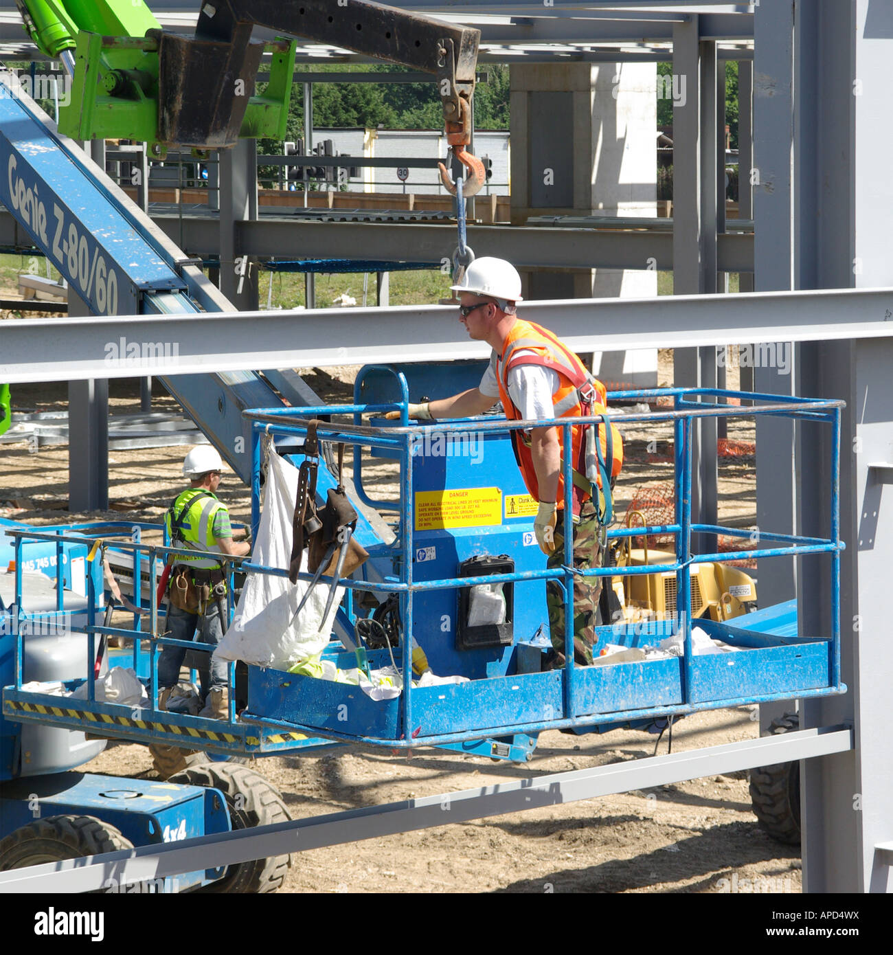 Construction industry building site close up steel erector man on ...