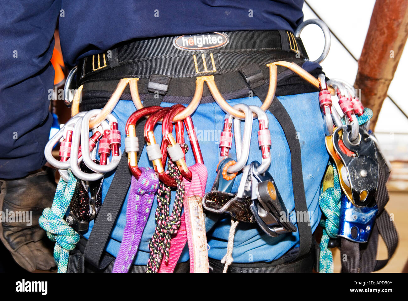 Climber Blackpool Tower wearing safety harness with karabiners Stock