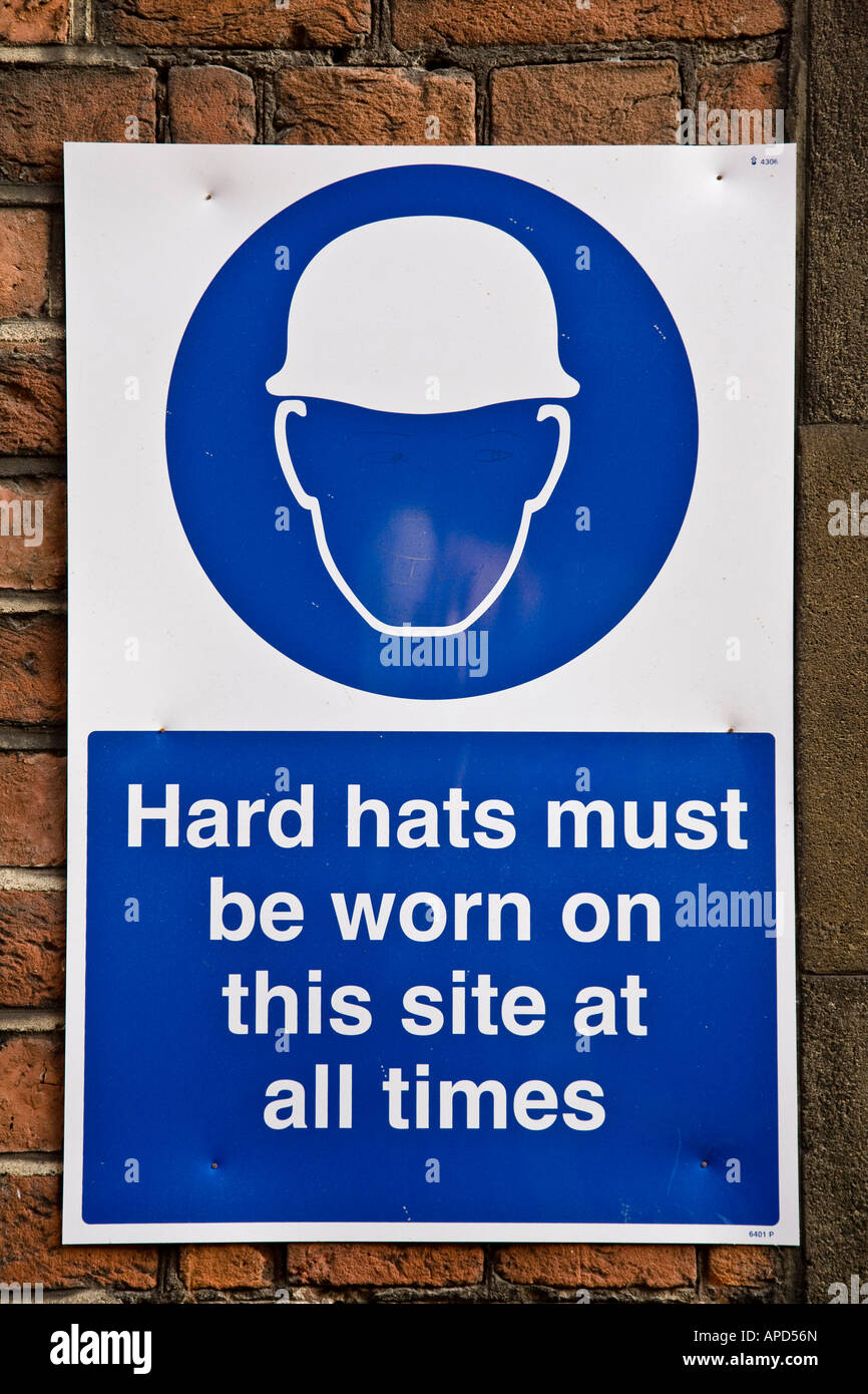 Hard hat safety sign outside a building site. Closer inspection shows