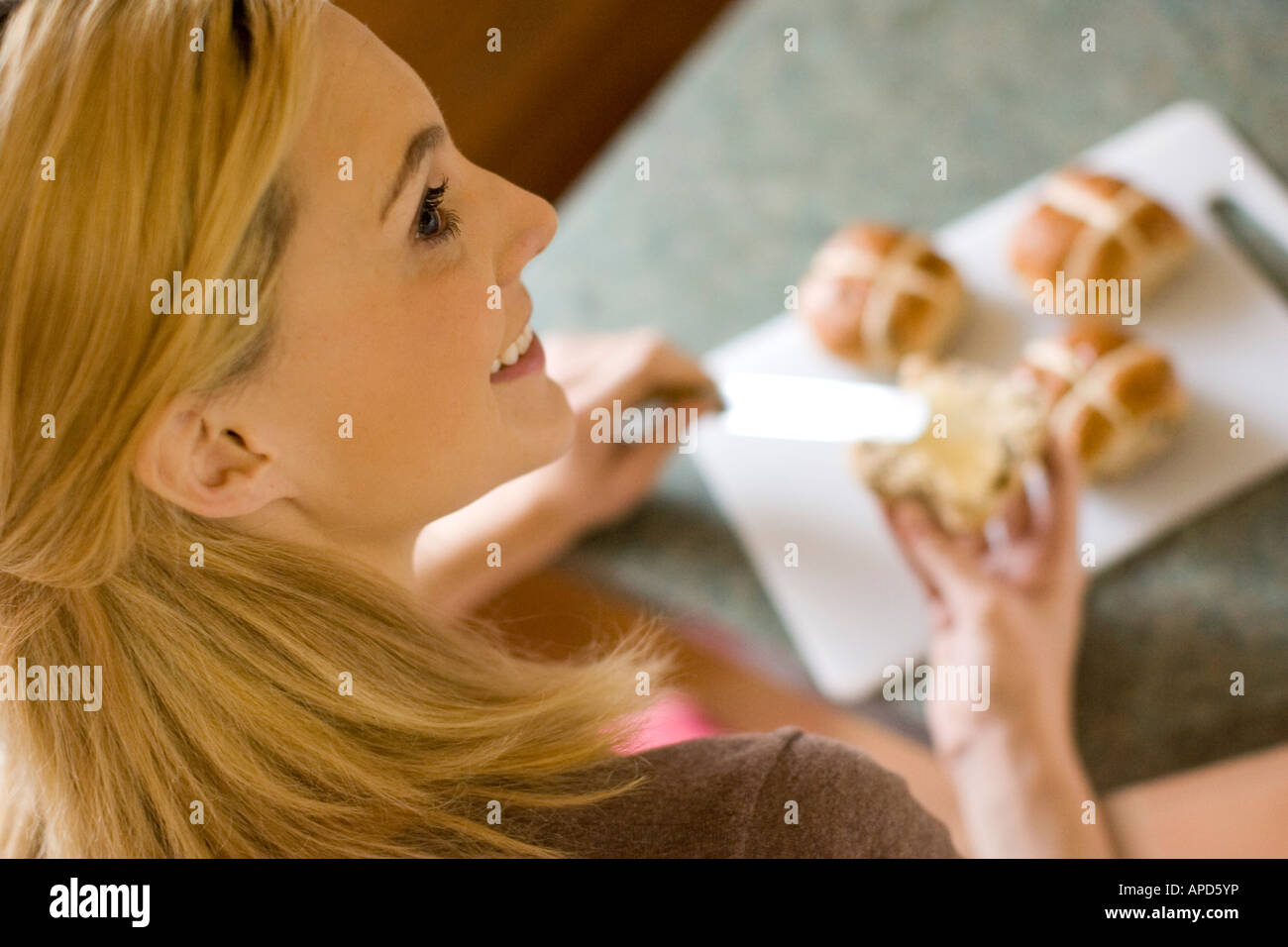 Woman Eating Hot Cross Buns Stock Photo 15754137 Alamy