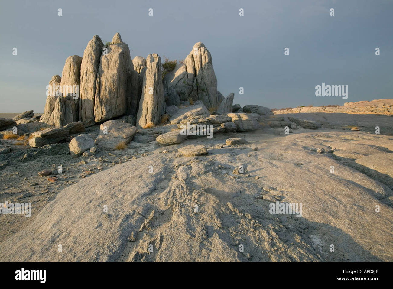 https://c8.alamy.com/comp/APD8JF/africa-botswana-morning-sun-lights-pointed-rocks-at-kubu-island-on-APD8JF.jpg