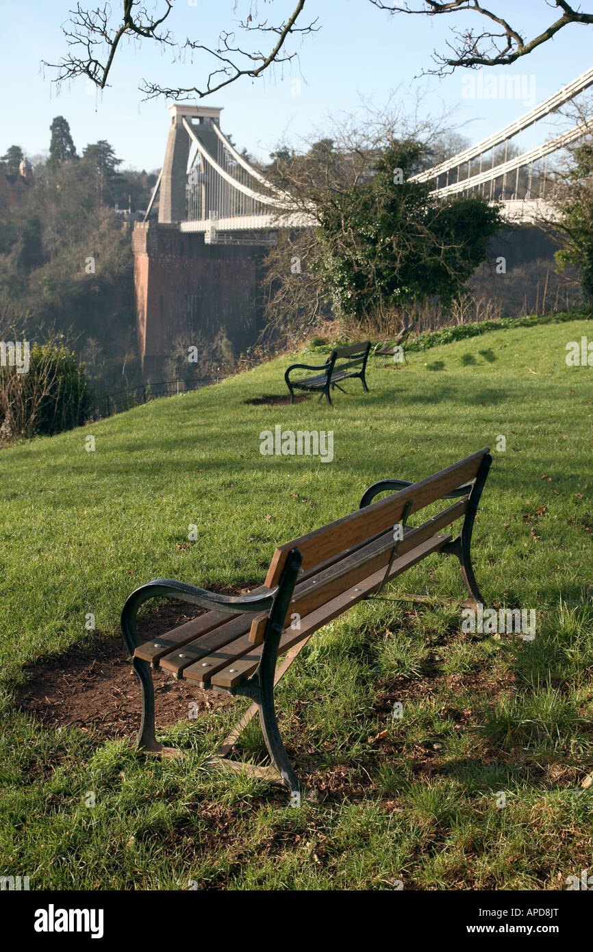 A park bench looking across the Avon Gorge by Brunel's historic Suspension bridge in Clifton Bristol U.K. Stock Photo