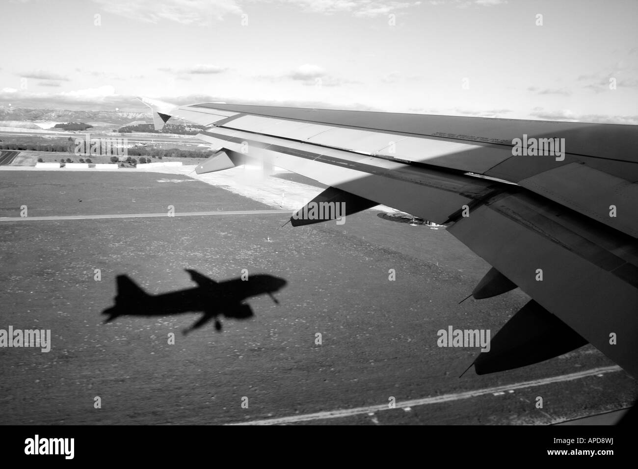 Shadow of plane at Madrid airport Stock Photo