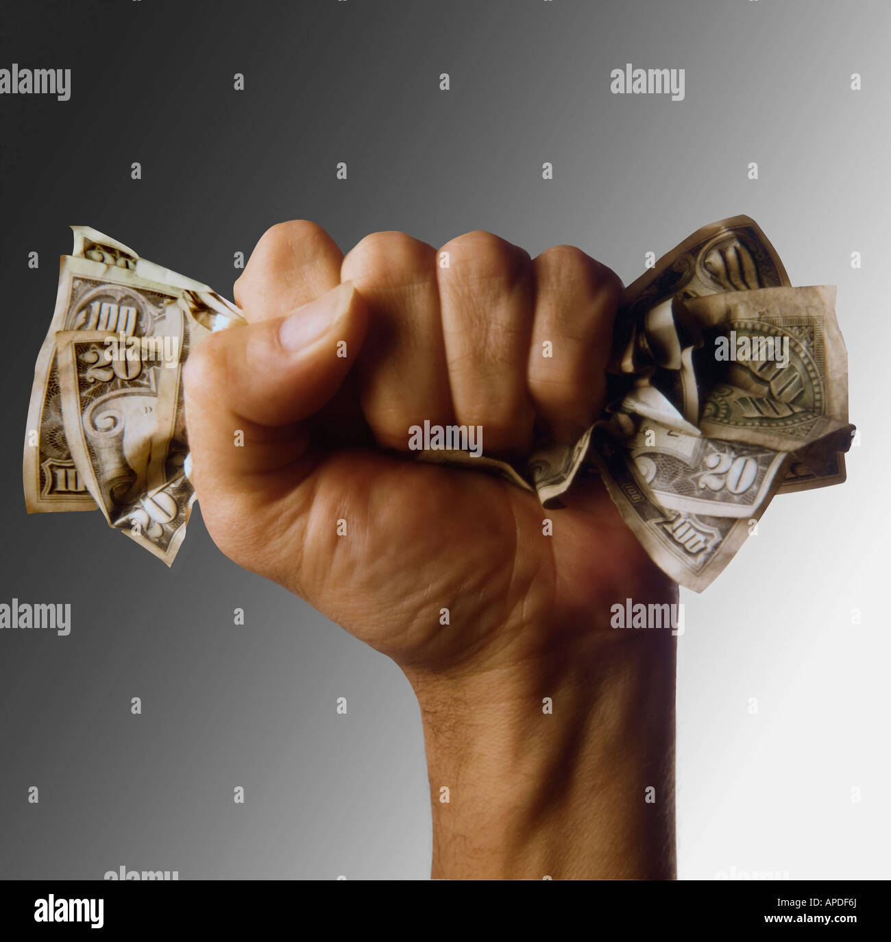 Fist crushing money Stock Photo 15757241 Alamy